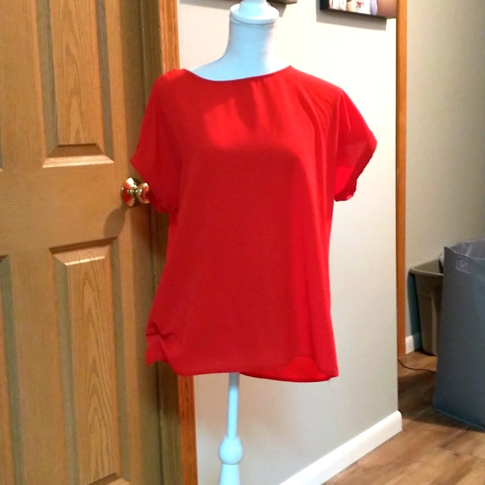 A red flowy T shirt